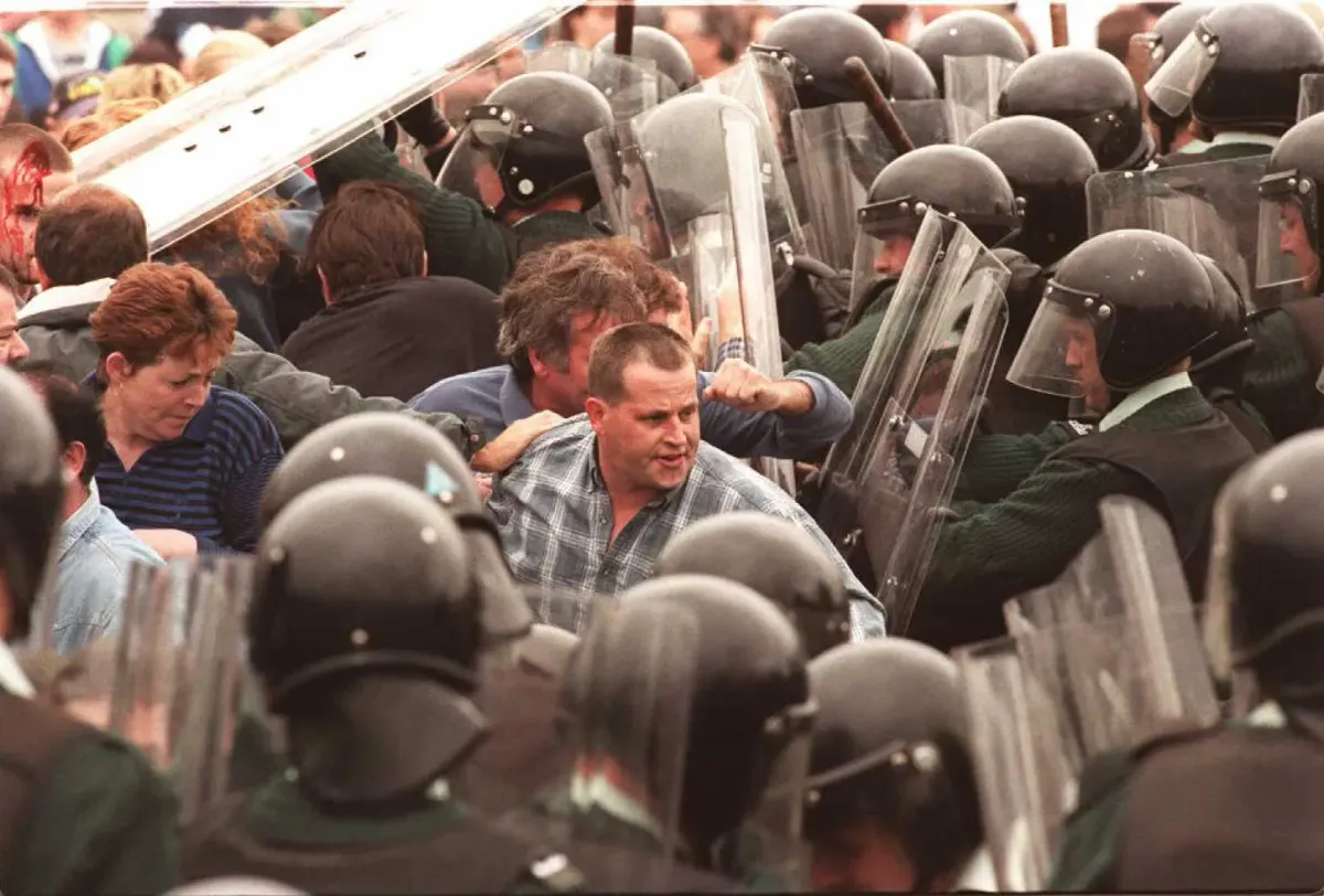 The Human Cost Of Orange Supremacy