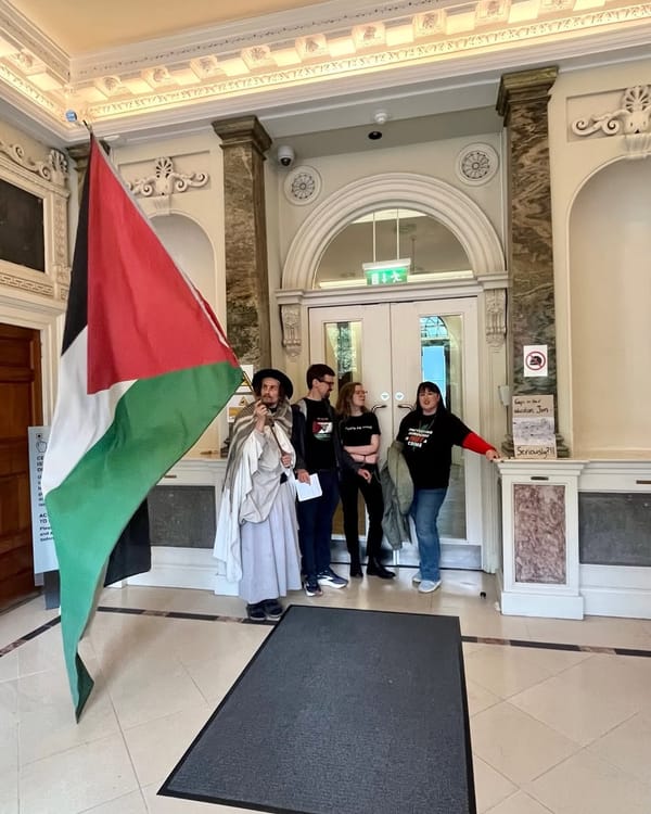 Arrests Made As Activists Chain Themselves To Department Of Justice For Gaza Visas